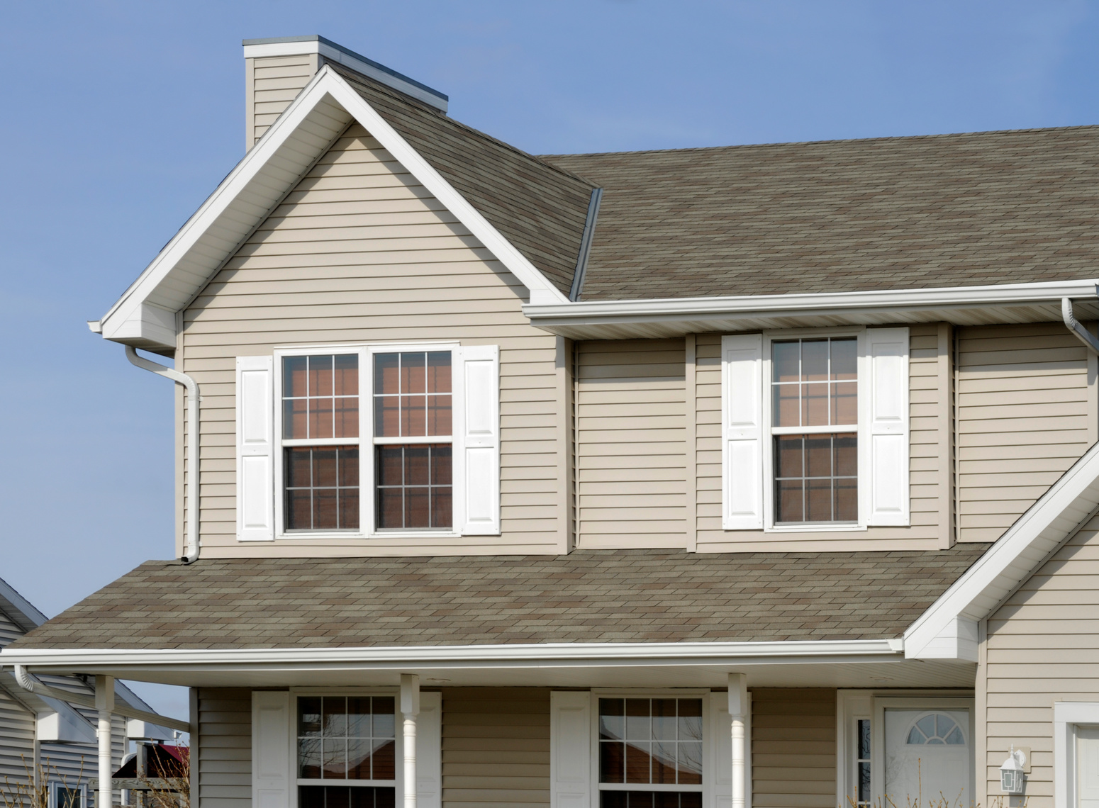 Two story white gutters seamless roll formed